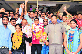 Indian junior hockey bronze medalist Vandana Kataria being welcomed in Haridwar on Sunday.