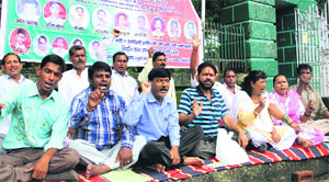 Members of the Uttarakhand Kranti Manch stage a protest at Gandhi Park in Dehradun on Sunday. 