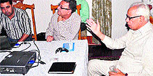 Governor NN Vohra views Lakes and Waterways Development Authority Vice-Chairman Irfan Yasin's presentation at Raj Bhawan in Srinagar on Sunday