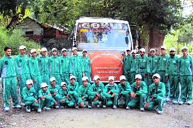 Youth pose for a photograph during the flagging off ceremony at Rampur