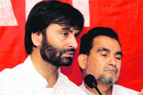Jammu and Kashmir Liberation Front chairman Mohammad Yasin Malik addresses mediapersons in Srinagar on Sunday