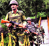 BSF men patrol near the Line of Control in Poonch on Sunday