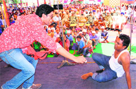 Artistes perform a play organised as part of a BSF de-addiction awareness drive in an Amritsar village.