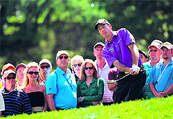 Jim Furyk plays a pitch shot on the third hole during the third round of the PGA Championship in Rochester, New York, on Saturday