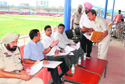 Deputy Commissioner KK Yadav reviews the arrangements for the Independence Day function at the Sports Stadium in Bathinda on Monday. 