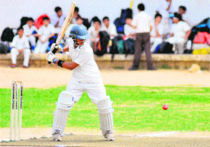 A batsman plays a shot during a match for the St Josephs Cricket Trophy in Chandigarh on Monday. 