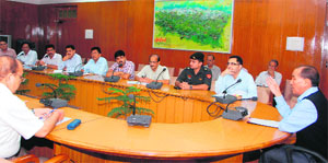 Chief Secretary Subhash Kumar holds a meeting with senior officials in Dehradun on Monday.  