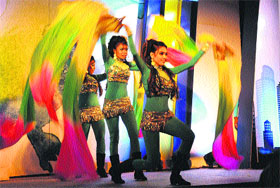  Artistes perform during an inaugural function of a housing society at Bhiwadi in Gurgaon. 