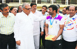 Chief Minister Bhupinder Hooda congratulates Virender at his residence in Delhi. 