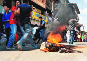 Activists of the Jammu Kashmir Liberation Front during a protest against Kishtwar violence, ina Srinagar on Monday. 