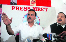 Sajjad Ahmed Kichloo addresses mediapersons before resigning as Minister of State for Home, in Jammu on Monday
