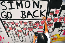 A student at work on 70 feet long painting on freedom struggle at KVM School in Ludhiana. 