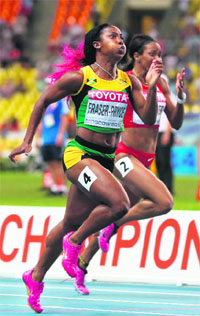 Shelly-Ann Fraser-Pryce wins the 100 metres final at the World Championships at the Luzhniki stadium in Moscow on Monday.
