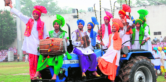 Dhol beats: Boys perform bhangra during a rehearsal for the Independence Day celebrations at Guru Nanak Stadium in Amritsar on Tuesday.