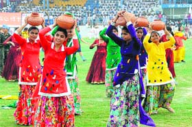 Schoolchildren perform a dance during the rehearsals
