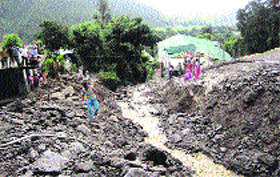 Landslide poses a threat to many houses at Deol village near Palampur.