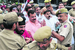 Policemen restrain protesting Panthers Party activists in Jammu on Tuesday. Tribune photo: Inderjeet Singh