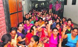 Students of the College of Agricultural Engineering raise slogans against the university authorities on the PAU campus on Tuesday. Tribune Photo: Himanshu Mahajan