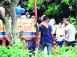 LPG cylinders of Nirjag Gas Agency being delivered on a tractor-trailer alongside on Pakhowal Road. A Tribune Photograph