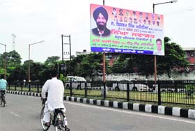 A hoarding put up by the Youth Akali Dal with the picture of Cabinet Minister Bikram Singh Majithia in Patiala