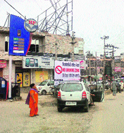A flex board carrying the no-smoking zone sign has been put up near a petrol pump on Mall Road in Bathinda.