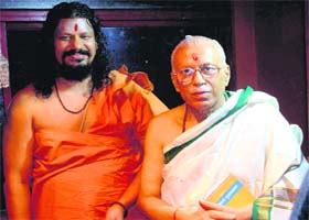 Maha Mandaleshwar Kailshanand Brahamchari and Pt Acharya Vishnu Dutt Rakesh after performing maha mrityunjay for the disaster victims at Dakshin Kali Temple in Haridwar on Wednesday