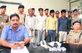 Dehradun SSP Kewal Khurana presents the accused before the media in Dehradun on Wednesday