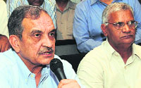 Rajya Sabha member Birender Singh addresses a press conference in Chandigarh on Wednesday. 