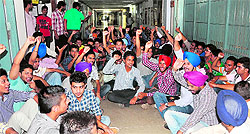 Students of the College of Agriculture Engineering raise slogans on the PAU campus