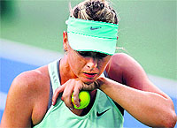 Maria Sharapova reacts to her play against Sloane Stephens at the Cincinnati Open on Tuesday