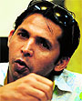 Mohammad Asif speaks during a news conference on Wednesday