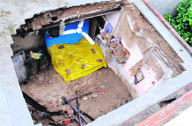 The buildings which collapsed on the Batala road after downpour in Amritsar.