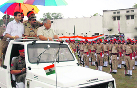 Health and Family Welfare Minister Madan Mohan Mittal inspects the parade during the Republic Day celebrations.