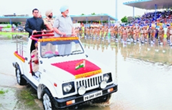Irrigation Minister Janmeja Singh Sekhon and Deputy Commissioner Kamal Kishore Yadav inspect the guard of honour during the district-level Independence Day function held at Multi-purpose Sports Stadium in Bathinda on Thursday.