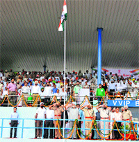 Irrigation Minister Janmeja Singh Sekhon takes salute from a police contingent during a march past at the district-level Independence Day function held at Multi-purpose Sports Stadium in Bathinda on Thursday.