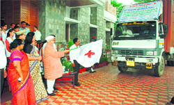 Governor Aziz Qureshi flags off relief supplies for disaster-hit areas from Raj Bhawan on Friday. A Tribune photograph