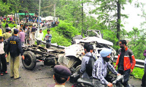 The mangled remains of the truck on Amb-Nehrian road in Una on Friday. 