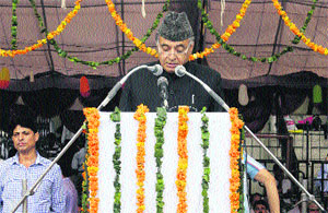 Transport Minister GS Bali addresses public during a function on Independence Day at Hamirpur. 