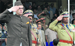 Chief Minister Omar Abdullah takes the salute during Independence Day celebrations in Srinagar on Thursday. Tribune photo: Amin War
