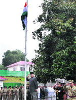 Governor NN Vohra takes the salute during the Independence Day function at Raj Bhawan on Thursday. A Tribune photograph