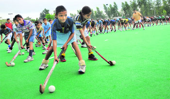 Young boys and girls train for hours at the hockey academy in Shahbad, Haryana. 