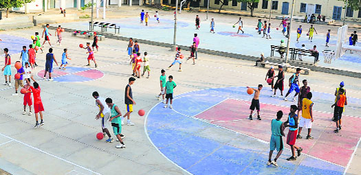 Students and the elderly start coming to the courts at the village near Mansa in the afternoon and the practice sessions go on till late in the night. 