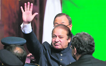 Prime Minister Nawaz Sharif waves to the crowd on the occasion of Pakistans independence day in Islamabad on August 14. 