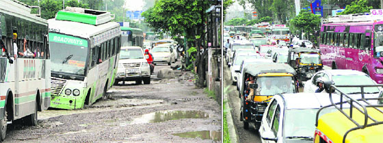 A bus tilts precariously as it crosses a sludge-filled pit on the PAP road in Jalandhar on Saturday; and (right) a traffic jam near the PAP Chowk. 