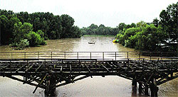 The flooded Jhelum at Sangam Bridge in Anantnang district