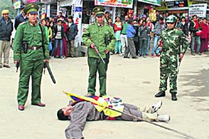 Tibetans-in-exile stage a street play as a protest against the government of China
