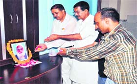 Activists of the Uttarakhand Kranti Dal pay floral tributes to statehood fighter Indramani Badoni on his 14th death anniversary in Haridwar on Sunday