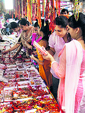 Women buy Rakhi ahead of Raksha Bandhan in Jammu on Sunday