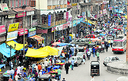 People throng the Ghanta Ghar area of the Lal Chowk after a days strike in Srinagar on Sunday