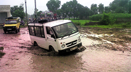 A vehicle stuck amid sewerage in Ferozepur.